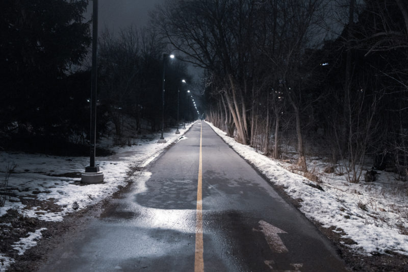 a nigh time view in the winter of a secion of the Iron Horse Trail in Kitchener