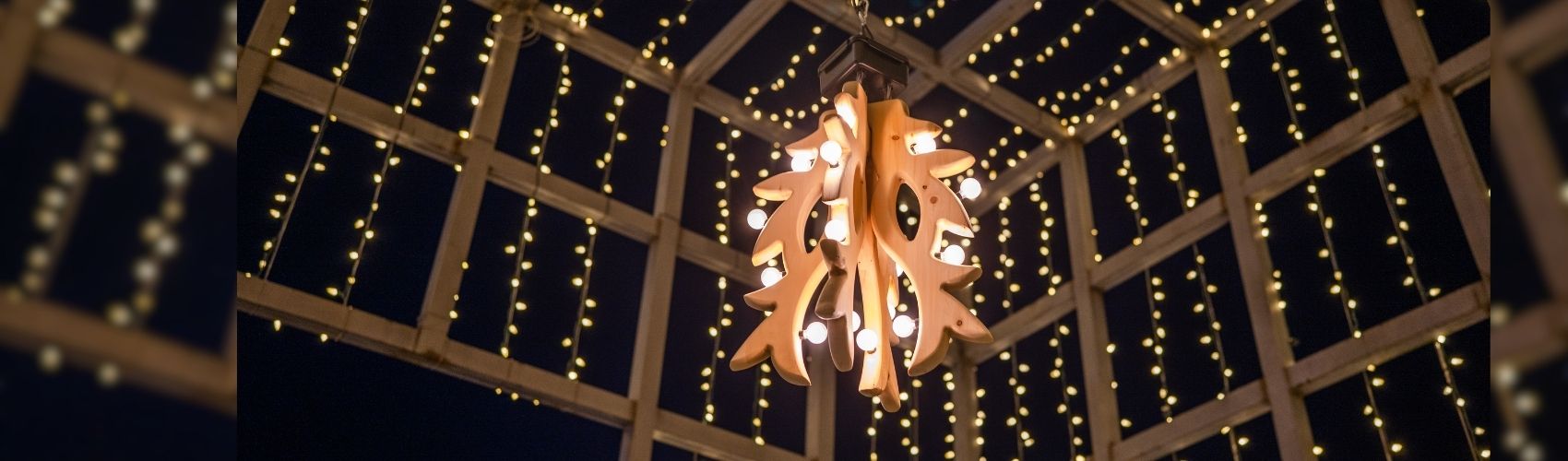 The mistletoe creation "GlowToe" designed by artist Skylar Dietze, hanging in the Downtown Kitchener Lightbox.