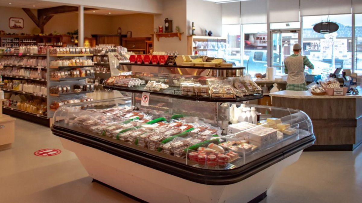 The interior counters and shelves filled with ready made sandwiches and other products at Kitchen Kuttings in Elimra.