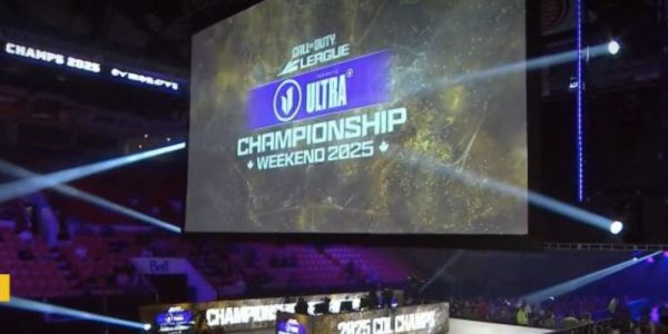 The inside of the Kitchener Memorial Auditorium aet up for the Call of Duty League Championship. There is a large screen in the middle of the arena with the logo for the championship on it, and the words "Kitchener, Ontario" superimposed at the bottom of the image.
