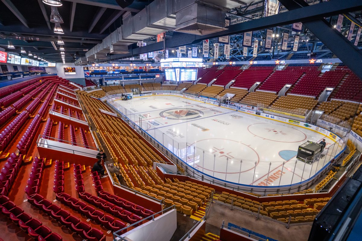 The interior of the Dom Cardillo arena at the Kitchener Memorial Auditorium in Kitchener. The ice in the arena is logoed with the Kitchener Rangers logo.