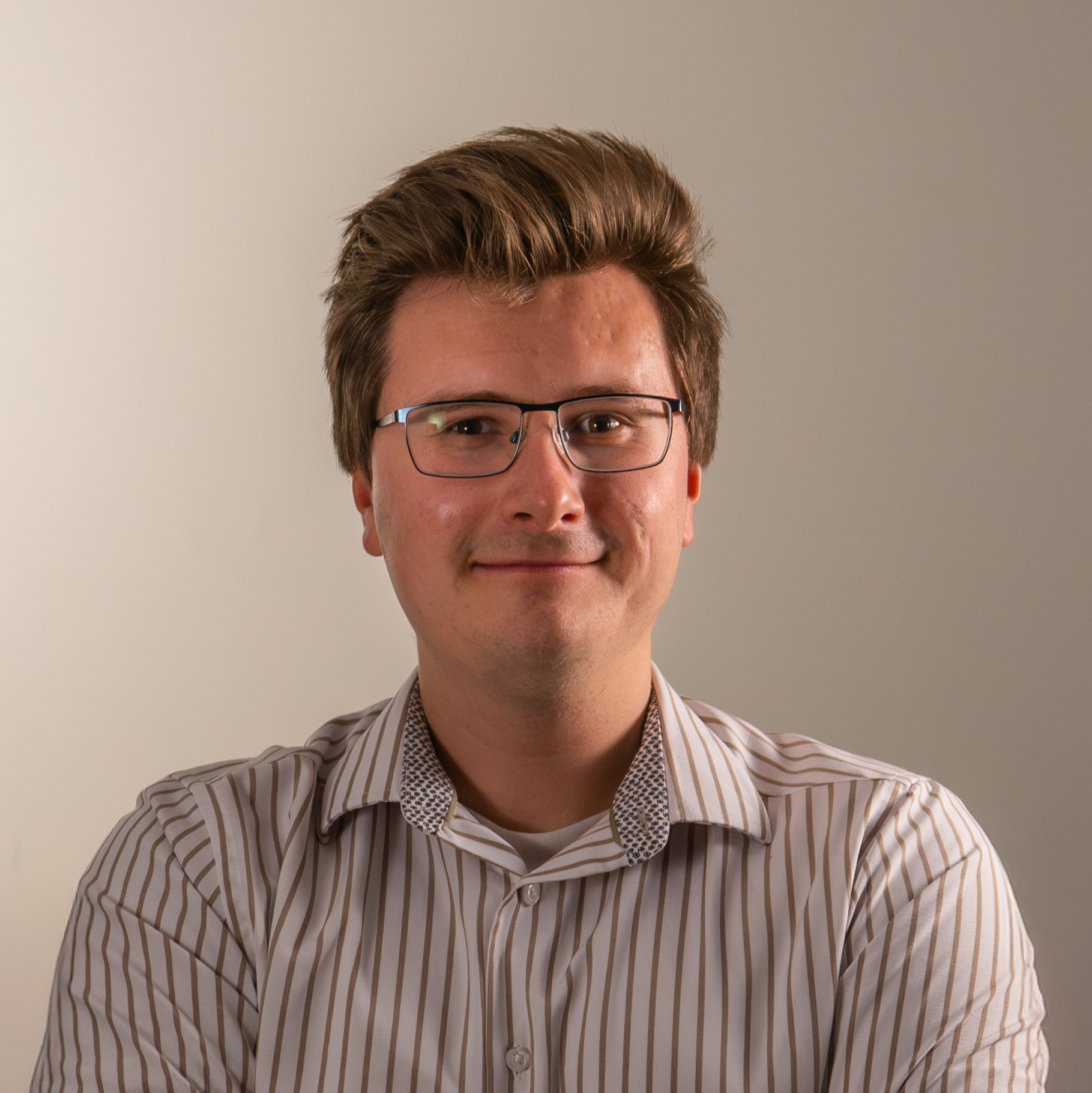 The headshot of Brenden MacDonald, Media Production specialist at Explore Waterloo Region