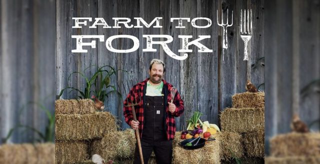 A porter promoting Farm to Fork TV. Chef Nick Benninger is standing with overalls and holding a pitch fork, surrounded by straw bales and a plate of food displayed on one of the bales.