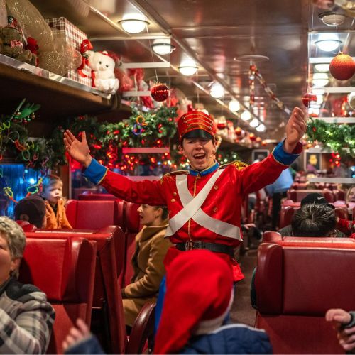 An actor in a nutcracker costume entertains the passengers on one of Waterloo Central Railway's holiday train rides.