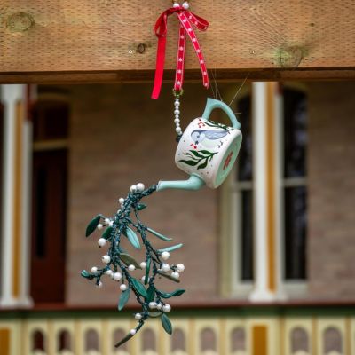 A mistletoe creation by artist Laura Kwok hanging at Castle Kilbride in Wilmot Township. Mistletoe is spilling out of a teapot.