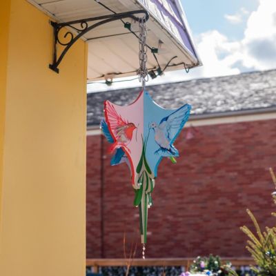 A 3D artist created mistletoe featuring 4 different birds carrying mistletoe in their beaks, that is part of the 2025 Mistletoe Trail.